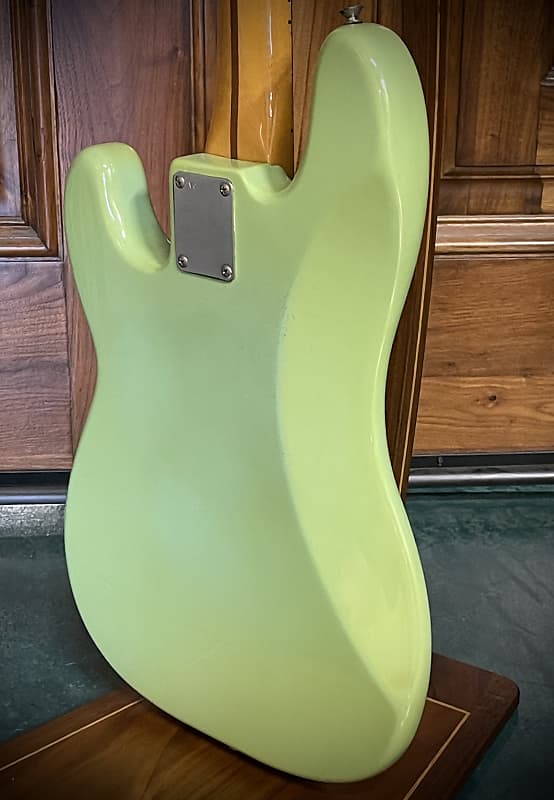 Surf Green Over Candy Apple Red Fender American Vintage '57 Reissue Pr